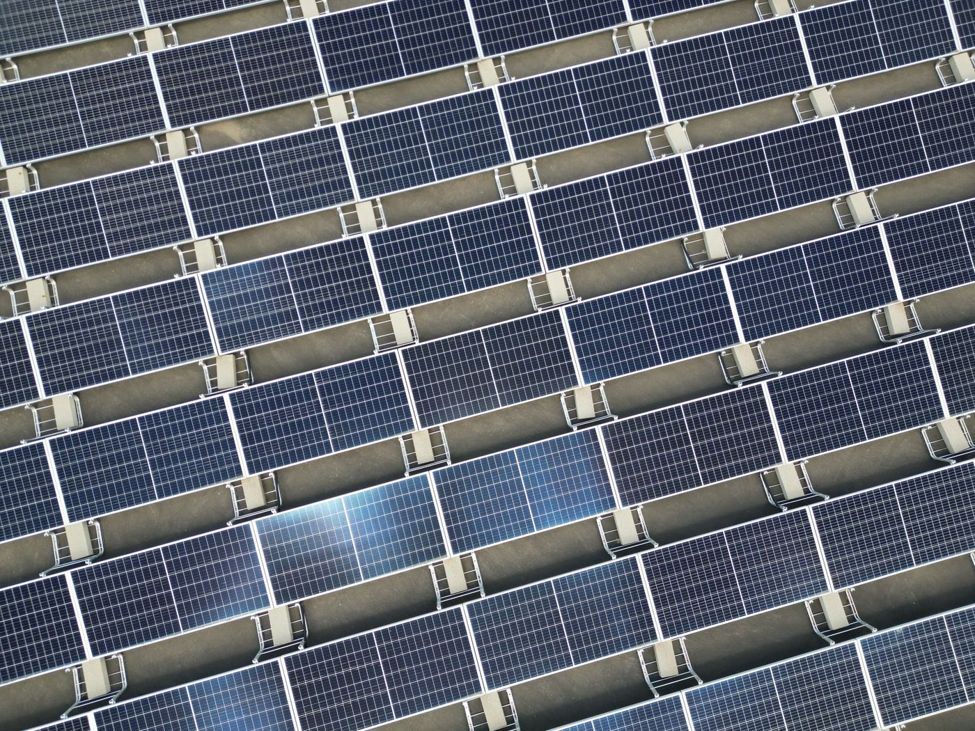 Aerial view of utility-scale solar panel array